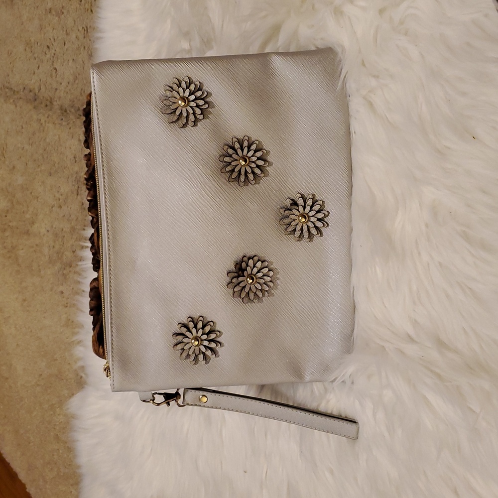 Silver large wristlet.